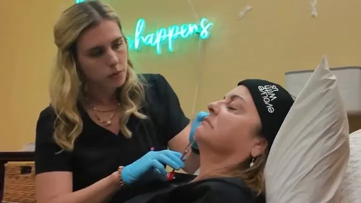 Megan Sosnick, RN, placing filler along a patient's smile line during an Evolysse Form treatment at Reviv Med Spa in Millbrae, California