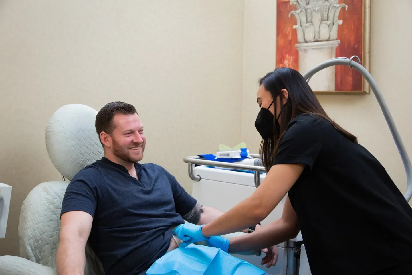 Body treatment in progress at Reviv Med Spa, Millbrae — provider performing a body-area device treatment