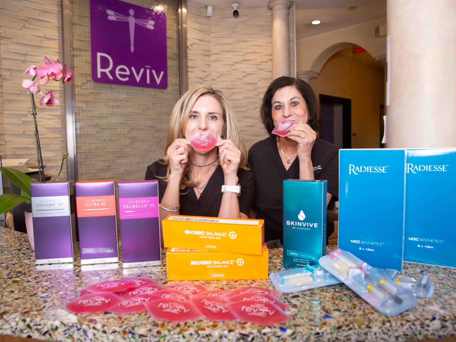 Reviv Med Spa team at the lip filler bar with the injectable collection, Millbrae